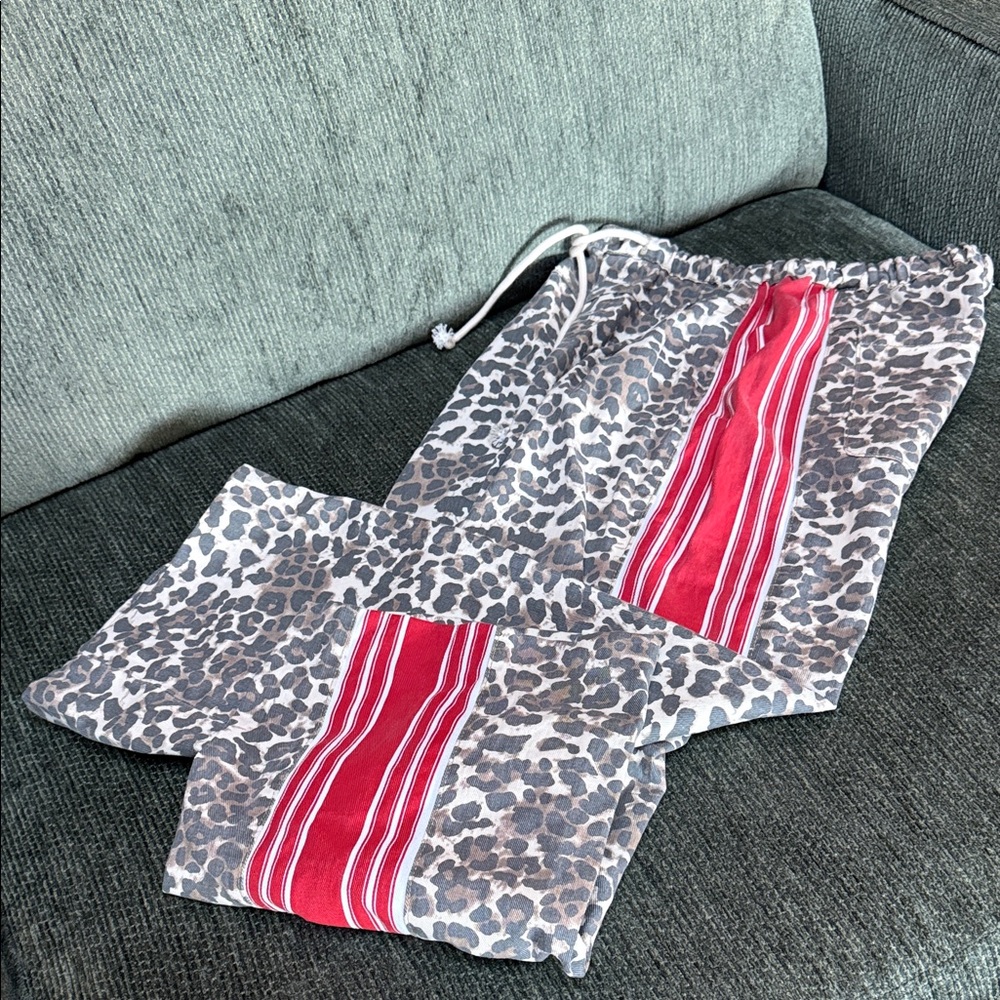 Leopard Print Pants with Red Striped Panel and Drawstring Waist.